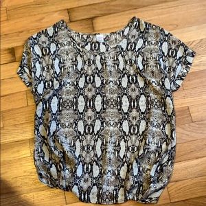 Super cute snake print, capped sleeves.